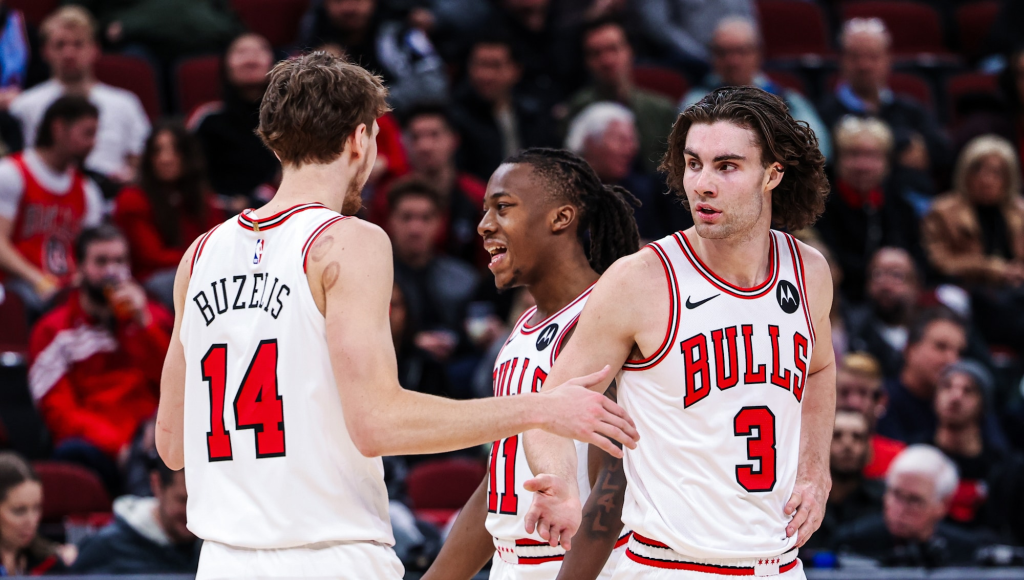 Bulls trio Matas Buzelis, Ayo Dosumno, and Josh Giddey communicating midgame.